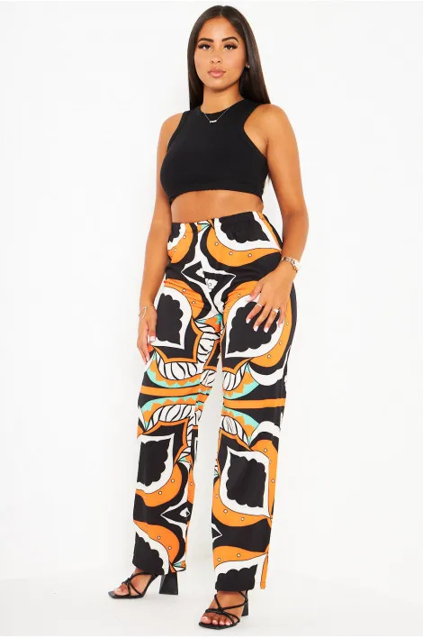Pantalon orange large et baroque